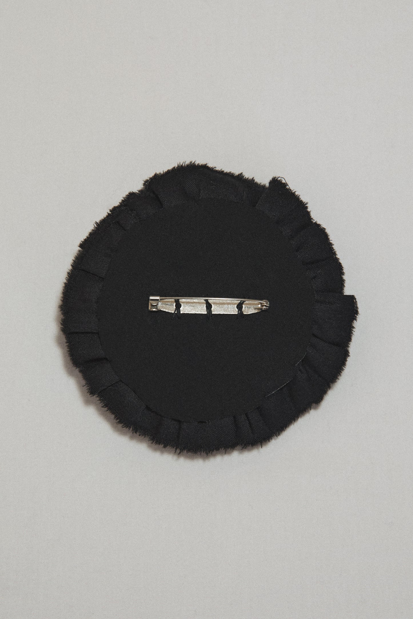 Pirouette Brooch in Black Cotton